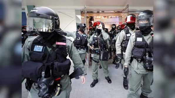 Hong Kong Police use pepper spray, arrest 12 as protesters target shopping mall near border with China