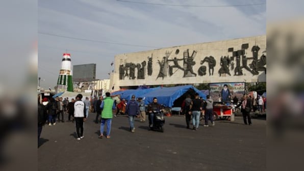 Angry Iraqis try to break into US Embassy in Baghdad after American airstrikes kill 25 fighters of Iran-backed Shiite milita
