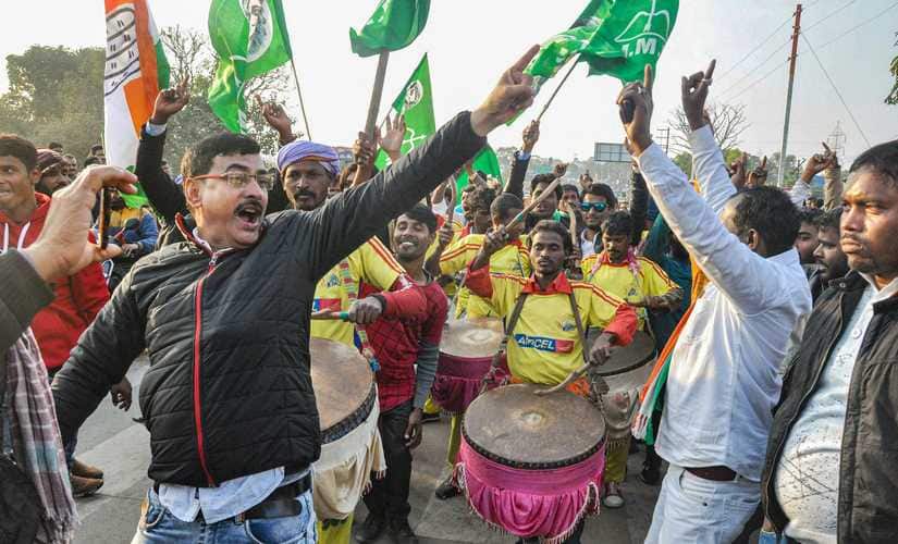Party workers and supporters of Congress and Jharkhand Mukti Morcha (JMM)  celebrate in Ranchi. PTI