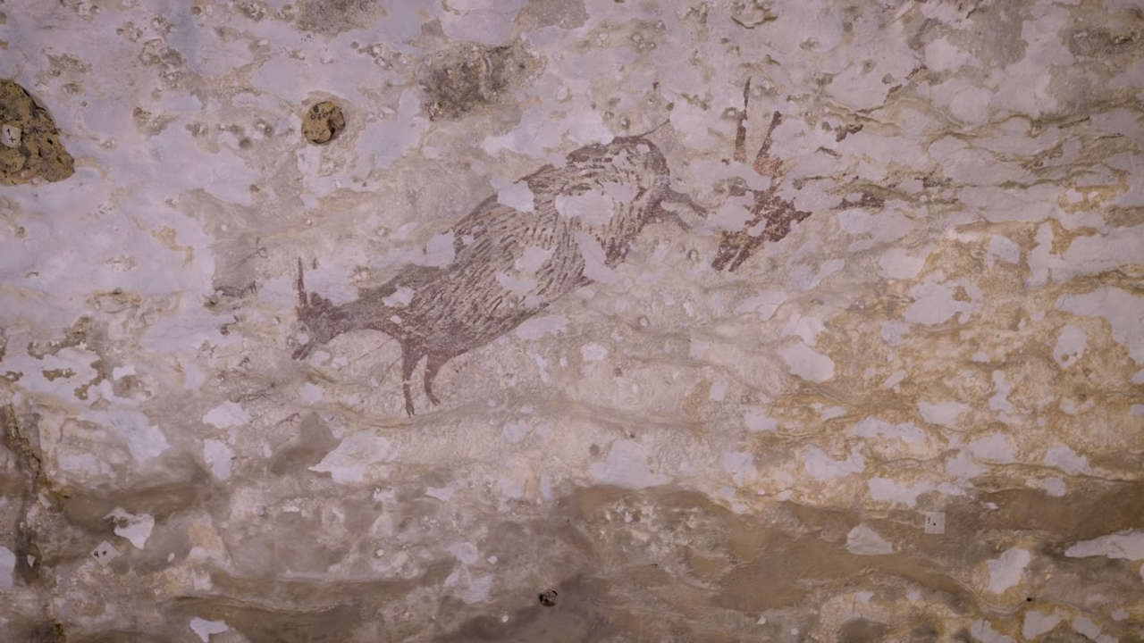 A 44,000-year-old cave painting is the oldest evidence of human storytelling, religion A 44,000-year-old cave painting is the oldest evidence of human storytelling, religion