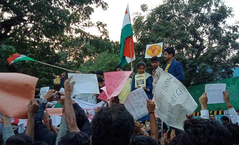 The organisers standing atop a platform at the rally. Firstpost/Neerja Deodhar