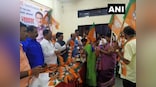 Upset with Uddhav Thackeray's decision to form alliance with NCP-Congress, 400 Shiv Sena workers join BJP at Mumbai event