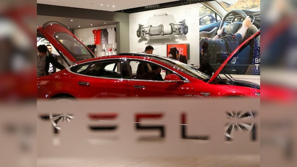 Tesla excluded from White House event for major electric vehicle announcement as General Motors, Ford and Stellantis attend