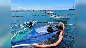 Barge carrying 600 gallons of diesel sinks off Galapagos Islands; Ecuador concerned over recovery, places barriers to prevent spread of possible leaks