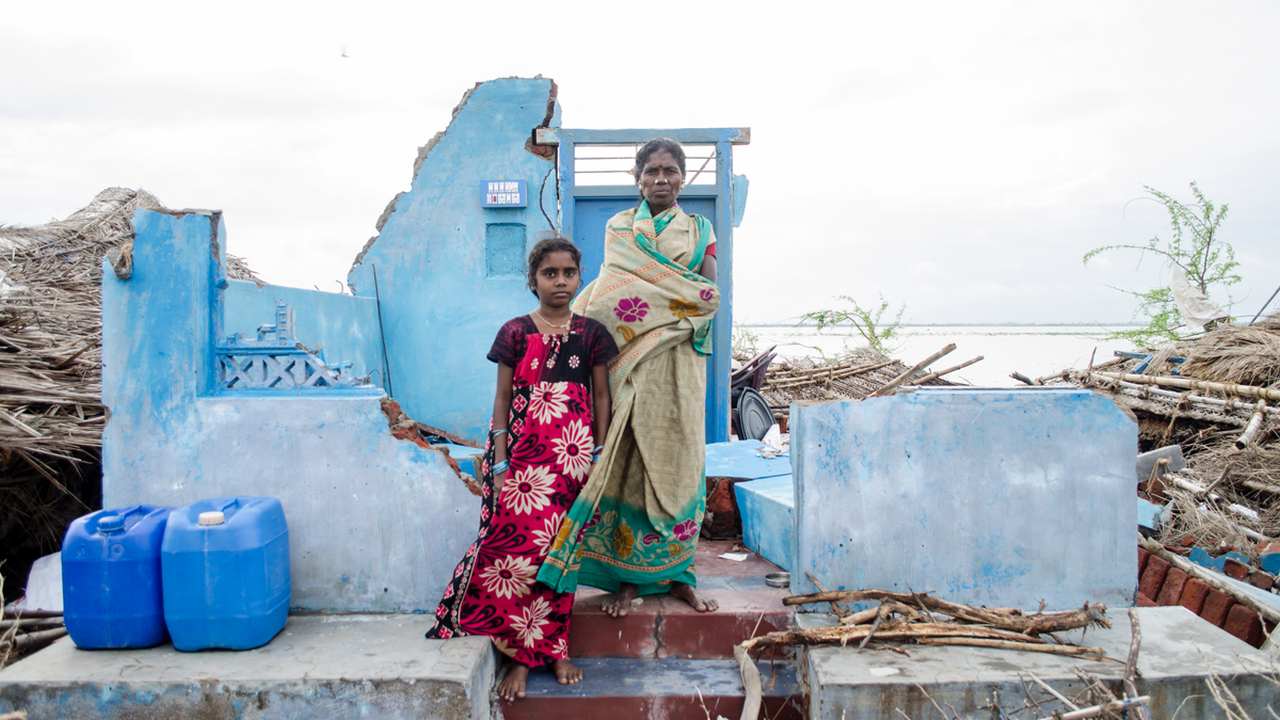 The women pictured are among 20 million people who have been forced to migrate due to extreme weather events fuelled by climate change. Around 80 percent of them are in Asia. Image: Palani Kumar.