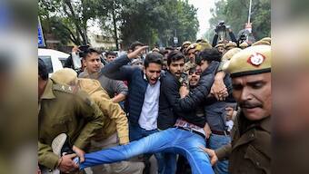 Citizenship Amendment Act protests: Students seek probe into Delhi Police using tear gas inside Jamia Milia Islamia; Mamata leads massive rally in Kolkata