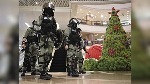 Hong Kong protests resume in shopping centres, streets: Demonstrators don Santa hats, clash with police in Mong Kok district