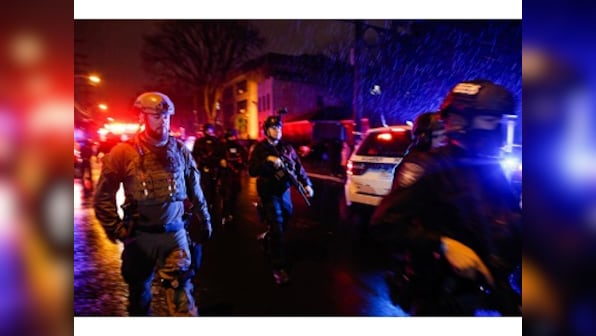 Jersey City shooting: Six people, including police officer and two suspects, killed after gun battle at supermarket