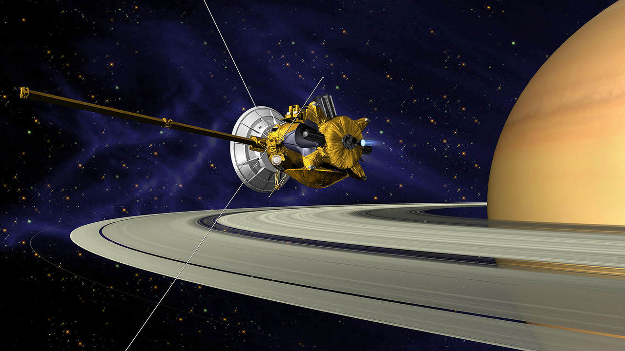 An artists concept of Cassini during the Saturn Orbit Insertion maneuver, just after the main engine has begun firing. Image credit: NASA/Wikipedia
