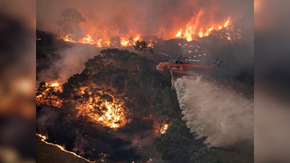 Australian Navy begins mass evacuations on East Coast as new wildfire threat looms due to searing weather in Victoria, New South Wales