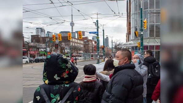 Wife of Canada’s first coronavirus patient tests positive, 19 suspected cases under investigation; govt advises citizens to avoid travel to Hubei