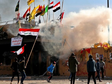 Iran-backed militia end siege of US embassy in Iraq after Washington dispatches extra troops, threatens reprisals against Tehran Iran-backed militia end siege of US embassy in Iraq after Washington dispatches extra troops, threatens reprisals against Tehran