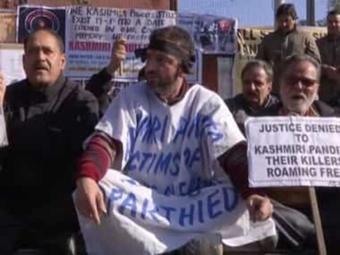 Kashmiri Pandits stage peaceful sit-in outside Raj Bhavan in Jammu to mark 30 years of exile, seek return and rehabilitation in Valley Kashmiri Pandits stage peaceful sit-in outside Raj Bhavan in Jammu to mark 30 years of exile, seek return and rehabilitation in Valley