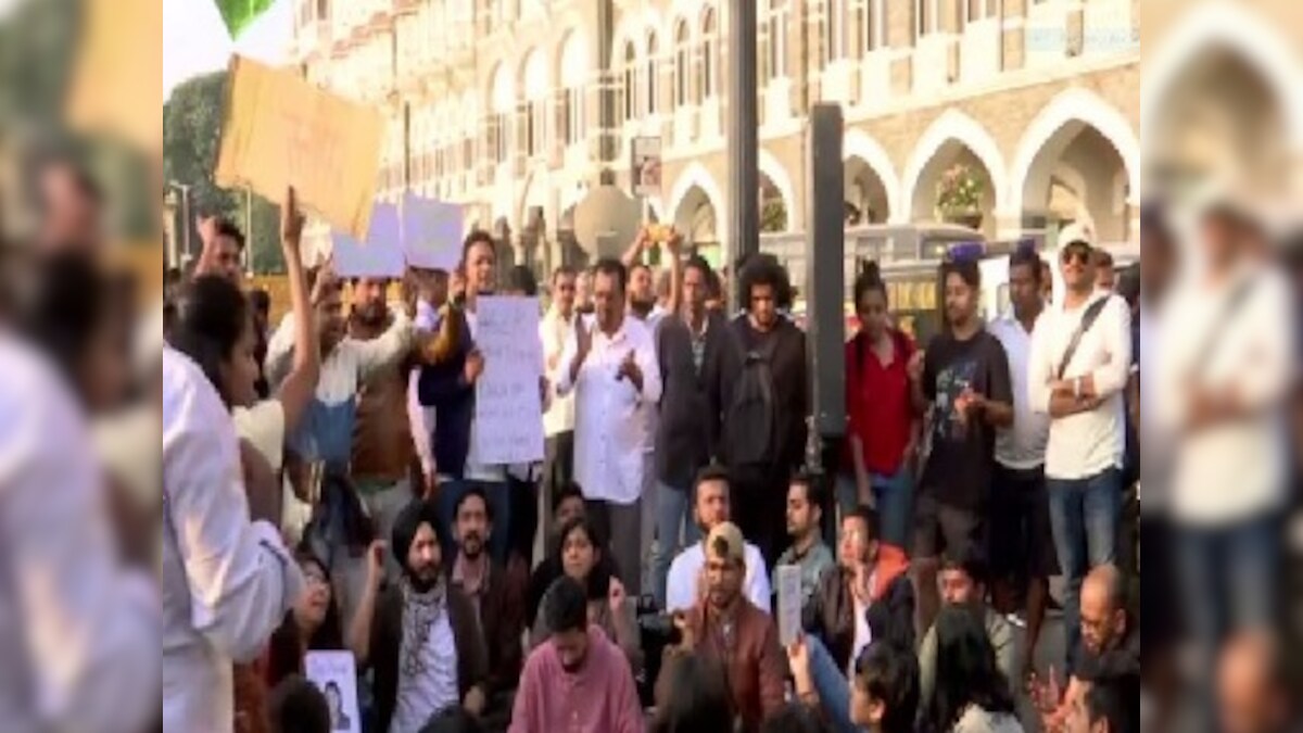 NCP’s Jitendra Awhad joins students protesting in Mumbai’s Gateway of India condemning violence at JNU