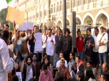 NCP’s Jitendra Awhad joins students protesting in Mumbai’s Gateway of India condemning violence at JNU NCP’s Jitendra Awhad joins students protesting in Mumbai’s Gateway of India condemning violence at JNU