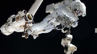 NASA, ESA astronauts finish tricky repairs on cosmic ray detector outside space station