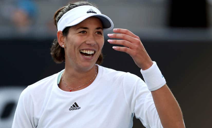 Garbine Muguruza celebrates after defeating Shelby Rogers in their first round singles match at the Australian Open. AP