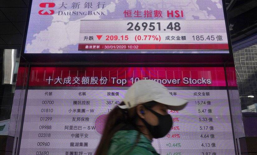 Shares have fallen sharply in Asia on Thursday as concern over the impact of the virus outbreak in China deepens. AP