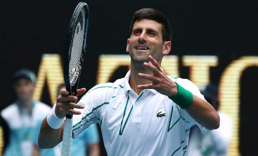 Novak Djokovic celebrates after defeating Tatsuma Ito in their second round singles match at the Australian Open. AP Photo