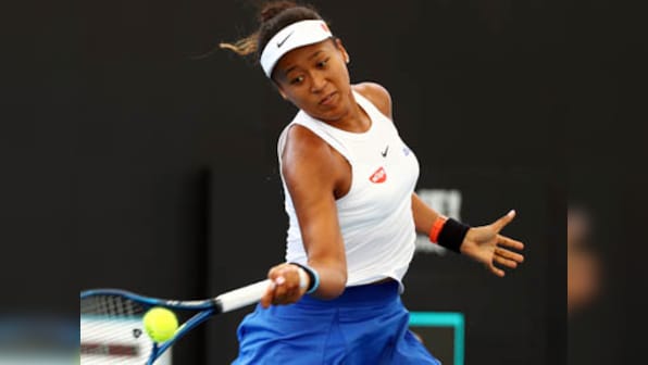 Brisbane International: Naomi Osaka battles through Maria Sakkari's attempted comeback to win opening match