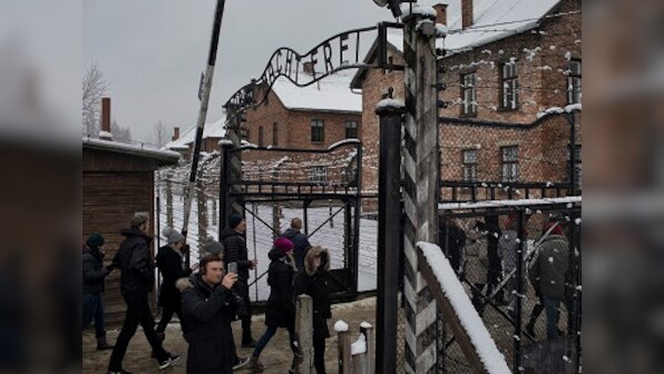 On 75th anniversary of liberation of Auschwitz, Holocaust survivors plead for world to 'never forget' atrocities