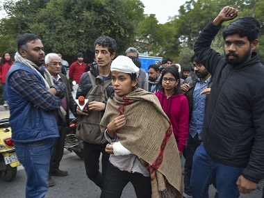 Delhi Police files FIR against JNUSU president Aishe Ghosh, 19 others for damaging server room, violence against staff; no mention of 'masked' attackers Delhi Police files FIR against JNUSU president Aishe Ghosh, 19 others for damaging server room, violence against staff; no mention of 'masked' attackers