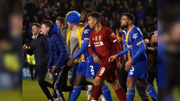 FA Cup: Liverpool squander two-goal lead against third-tier Shrewsbury to secure draw; Manchester United win big against Tranmere