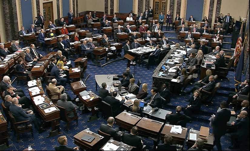 Senators vote on approving the rules for the impeachment trial against President Donald Trump. AP