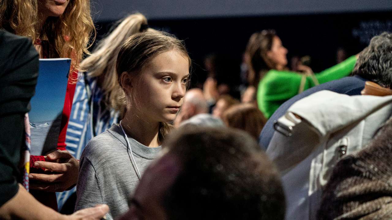 Swedish climate activist Greta Thunb_erg, 16, exits an auditorium after watching President Donald Trump deliver opening remarks at the World Economic Forum in Davos on 21 Jan 2020. Image: Anna Moneymaker/NYT