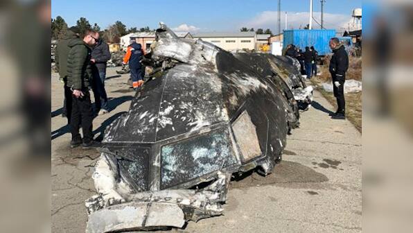 Iran's judiciary announces arrests over downing of Ukranian plane; Hassan Rouhani calls for special court to probe incident