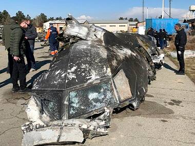 Iran's judiciary announces arrests over downing of Ukranian plane; Hassan Rouhani calls for special court to probe incident
