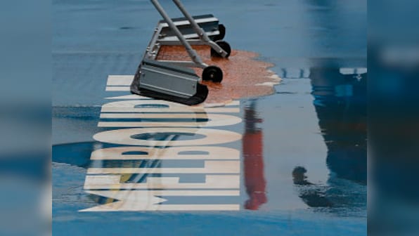 Australian Open 2020: Red dust, rain hit weather-plagued tournament with numerous matches postponed in Melbourne