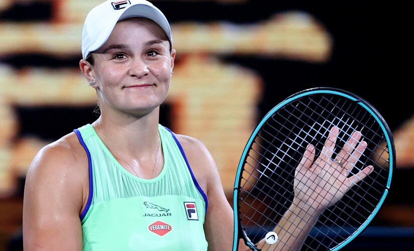 Australia’s Ashleigh Barty reacts after defeating Lesia Tsurenko of Ukraine in their first round singles match the Australian Open tennis championship in Melbourne, Australia, Monday, Jan. 20, 2020. (AP Photo/Lee Jin-man)