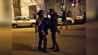 Videos show Iran security forces firing live ammunition, tear gas to disperse protests against shootdown of Ukrainian plane; authorities deny charge