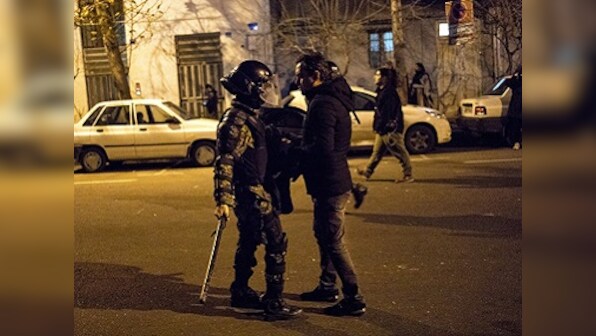 Videos show Iran security forces firing live ammunition, tear gas to disperse protests against shootdown of Ukrainian plane; authorities deny charge