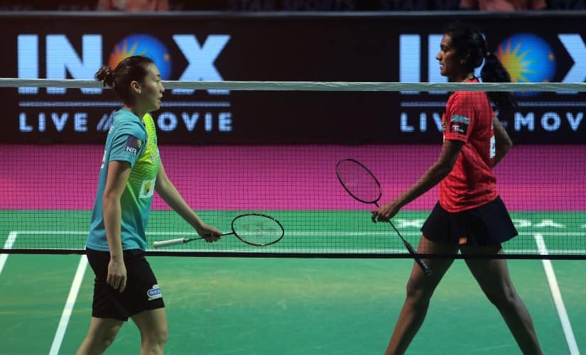 Michelle Li and PV Sindhu during the Premier Badminton League tie beTween North Eastern Warriors and Hyderabad Hunters.