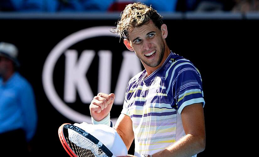 Austria's Dominic Thiem celebrates after defeating Taylor Fritz of the U.S. in their third round singles match at the Australian Open tennis championship in Melbourne, Australia, Saturday, Jan. 25, 2020. (AP Photo/Andy Brownbill)