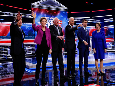 Democratic rivals unite against billionaire Michael Bloomberg in first presidential debate; accuse him of trying to buy his way into White House Democratic rivals unite against billionaire Michael Bloomberg in first presidential debate; accuse him of trying to buy his way into White House