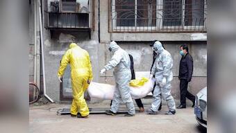 Chinese doctor who sounded the alarm to the world about coronavirus dies from virus; Beijing declares 'people's war'