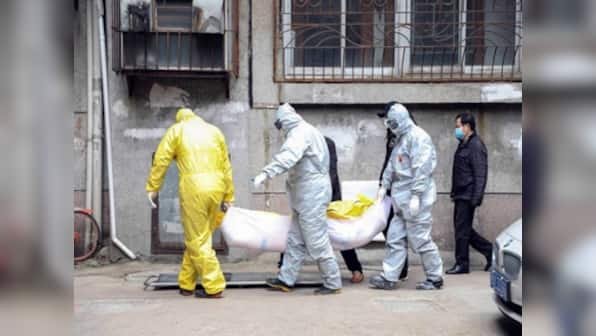 Chinese doctor who sounded the alarm to the world about coronavirus dies from virus; Beijing declares 'people's war'