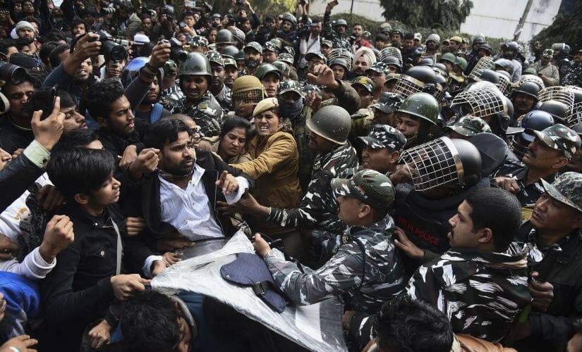 Students alleged brutal police force against peaceful protests, which included punching students in their stomach and even forcibly removing hijabs of some students. AP