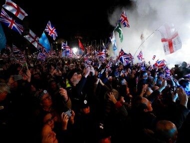 Britain's exit marks first stage of Brexit saga, UK to follow bloc rules during 11 months 'transition period'; EU to recover from 'historic blow' as ex-member becomes competition