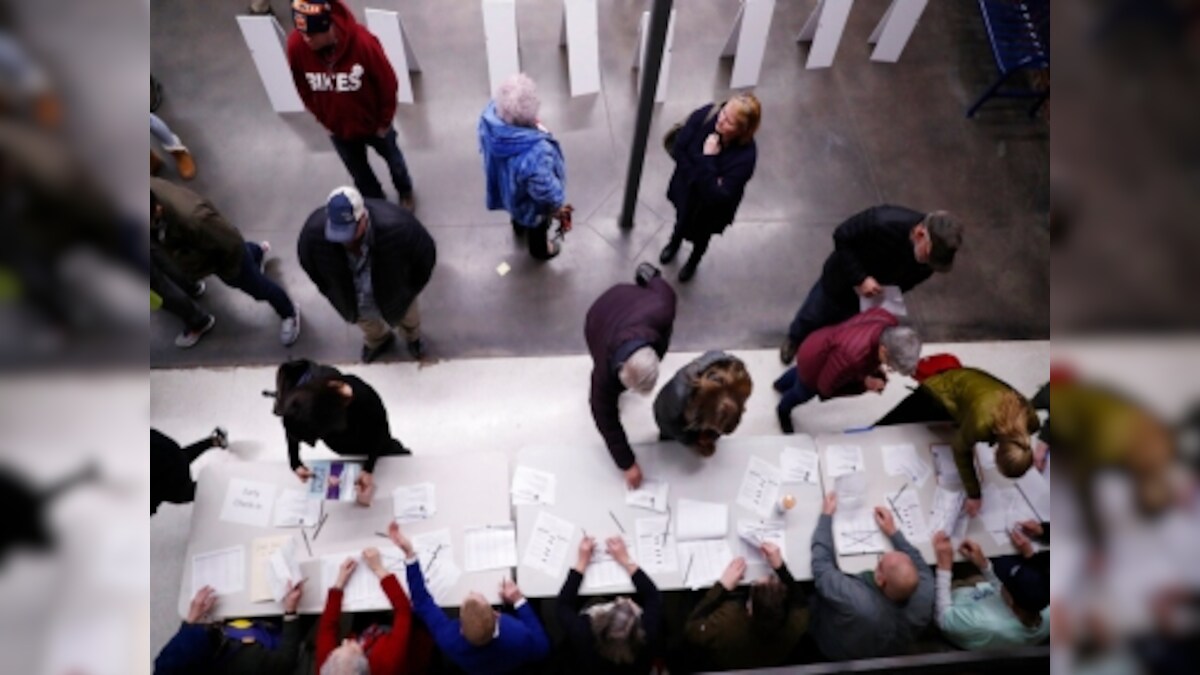 Caucus voting underway across Iowa with Democratic field likely to clarify; polls suggest Bernie Sanders may have narrow lead