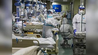 China coronavirus toll stands at 908 with rise in cases following sharp dip on Saturday; WHO experts likely to visit by Tuesday