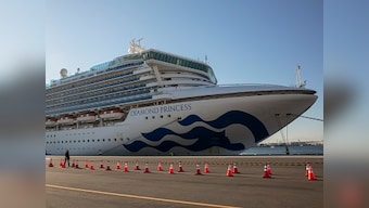 Passengers aboard Diamond Princess docked off Japanese coast leave cruise ship after two-week quarantine ends