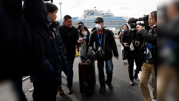 Hundreds of passengers begin leaving Diamond Princess after two-week quarantine; 169 of 542 people tested positive for coronavirus remain on ship