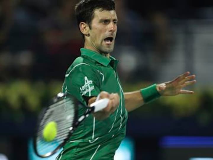 Dubai Tennis Championships: Novak Djokovic saves three match points to beat Gael Monfils in semi-final