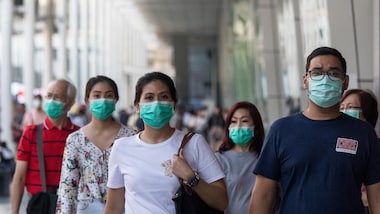 'No reason to lay back and relax' as imported coronavirus cases in China could start a second wave of infections