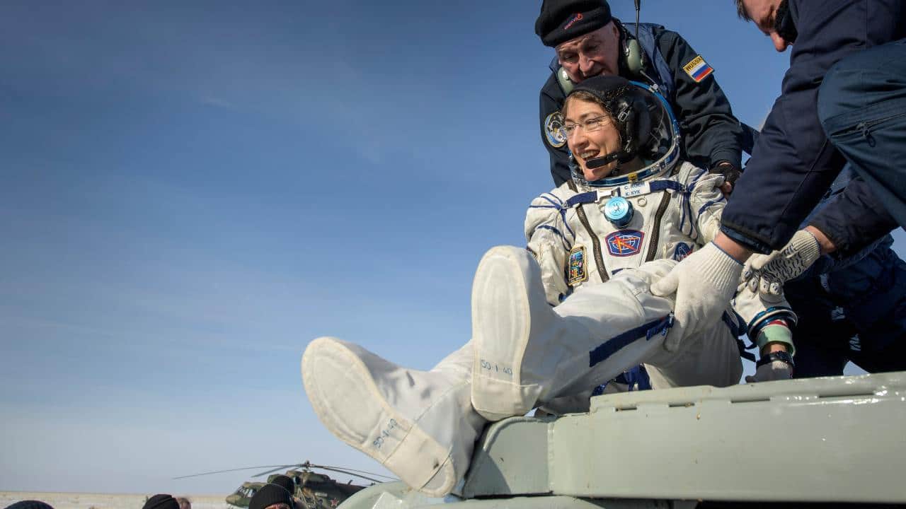 Christina Koch is helped out of the Soyuz MS-13 spacecraft minutes after she, Roscosmos Alexander Skvortsov, and ESA Luca Parmitano, land near Zhezkazgan, Kazakhsthan. Image: NASA