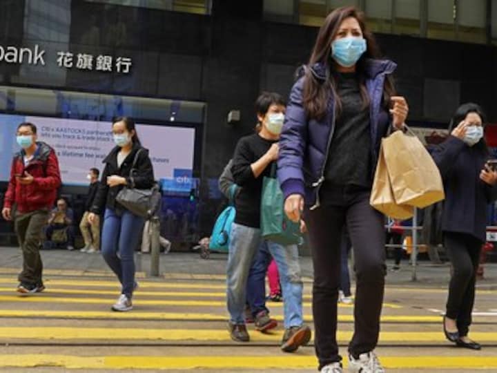 Hong Kong confirms first death due to coronavirus as local healthcare workers push for all borders to be sealed